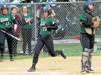 Christopher Dock s Emily Gordon scores the first run of the Pioneers' game against Delco Christian on Monday, April 27, 2015. (Debby High/For The Reporter)