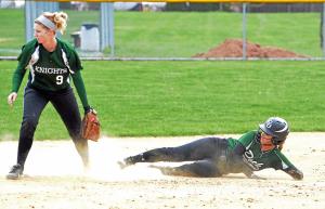 Christopher Dock's Emily Gordon slides into second during the Pioneers' game against Delco Christian on Monday, April 27, 2015. (Debby High/For The Reporter)