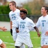 North Penn goalscorer Liam Parker (10) celebrates with teammates (from left) Noah Kwortnik, Colin Jerome (17) Eric Rosenblatt (6) and Nate Baxter after his goal against Strath Haven during first-half action of their contest at North Penn High School on Tuesday, Oct. 27, 2015. (Mark C Psoras/The Reporter)