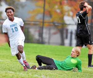 North Penn goal scorer Liam Parker (10) after putting a shot past Strath Haven goalie Adam Schultz (1) during firs- half action of their contest at North Penn High School on Tuesday, Oct. 27, 2015. (Mark C Psoras/The Reporter)